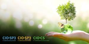 Abstract image of a hand holding green globe with a tree growing out of the top and and a butterfly perched on the side